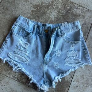 SHEIN Light Blue Ripped Jean Shorts